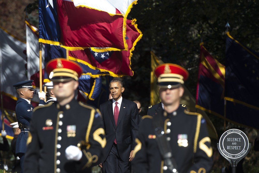 President Barack Obama arrives for a wreath laying ceremony at the Tomb of the Unknown Soldier in honor of Veteran's Day at Arlington National Cemetery in Arlington, Va., on Nov. 11, 2015. (Photo by Saul Loeb/AFP/Getty)