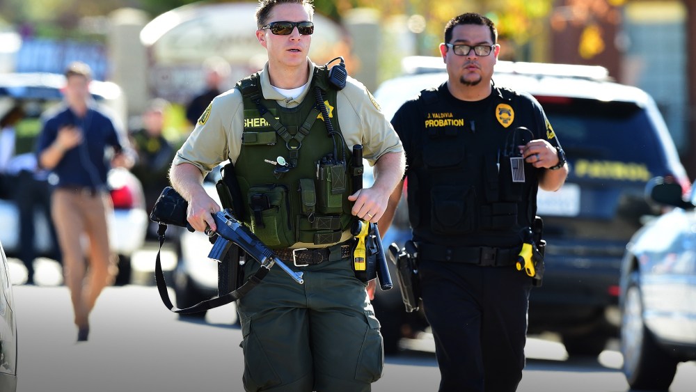 Police arrive at the scene of the mass shooting in San Bernardino, Calif. on Dec. 2, 2015. (Photo by Frederic J. Brown/AFP/Getty)