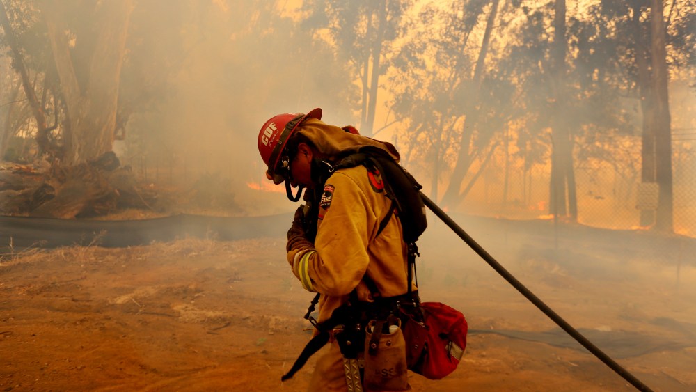 Firefighters battle wildfire in Fallbrook, California