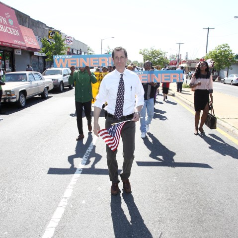 Anthony Weiner center, marches in the 24th Annual Laurelton Memorial Day Parade on Monday, May 27, 2013 in Queens, New York. (AP Photo/ Donald Traill)
