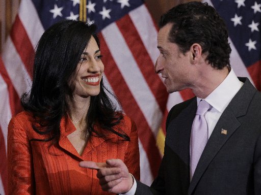 Rep. Anthony Weiner, D-N.Y., and his wife, Huma Abedin, aide to Secretary of State Hillary Rodham Clinton, are pictured after a ceremonial swearing in of the 112th Congress on Capitol Hill in Washington, Wednesday, Jan. 5, 2011. (AP Photo/Charles...