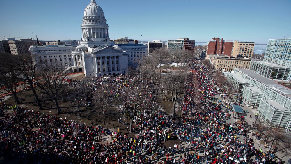 Protesters gather outside the state Capitol in Madison, Wis. on Saturday, Feb. 19, 2011.