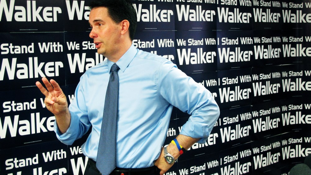 Wisconsin Gov. Scott Walker talks about a drop in state tax collections and a weak jobs report on Aug. 29, 2014, in Madison, Wis.