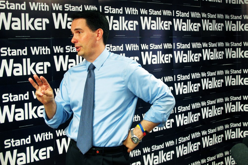 Wisconsin Gov. Scott Walker talks about a drop in state tax collections and a weak jobs report on Aug. 29, 2014, in Madison, Wis.
