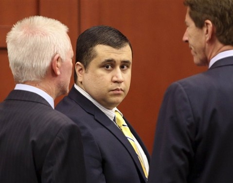 George Zimmerman stands in Seminole circuit court in Sanford, Fla., with his attorney Mark O'Mara, right, for a pre-trial hearing on April 30. (Joe Burbank / Pool via Reuters file)