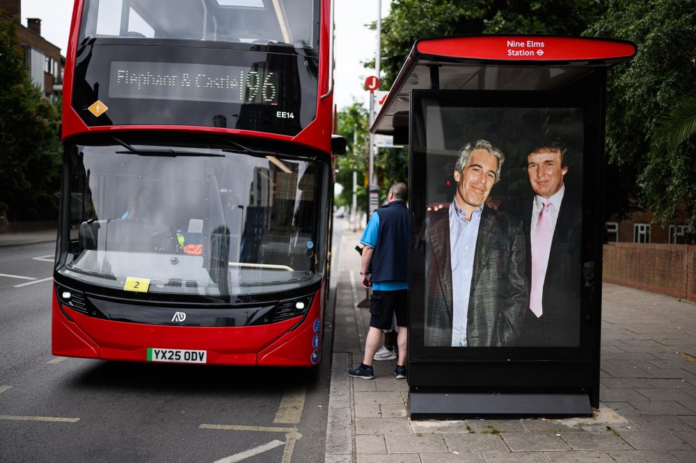 LONDON, ENGLAND - JULY 17: A photograph of President Donald Trump and Jeffrey Epstein is displayed on a bus shelter on July 17, 2025 in London.