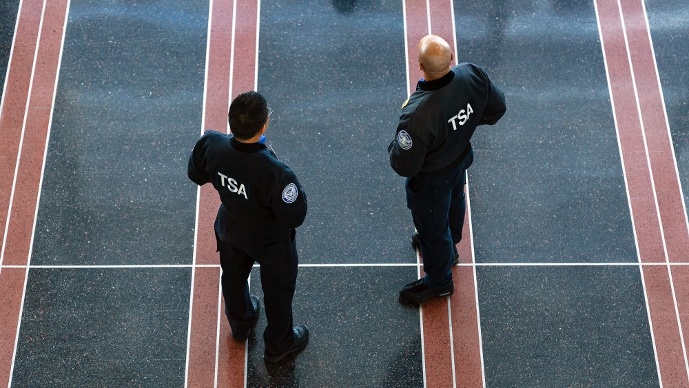 Transportation Security Administration (TSA) agents at Ronald Reagan Washington National Airport (DCA).
