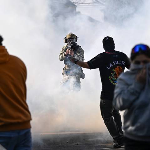 Residents and protesters clash with federal agents in Chicago.