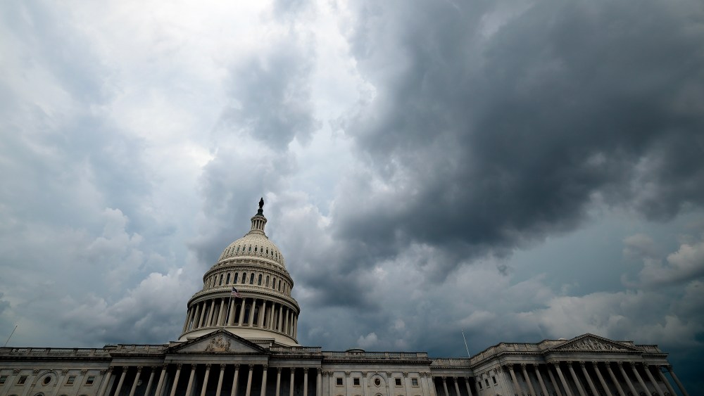 Storm clouds hover over the U.S. Capitol.