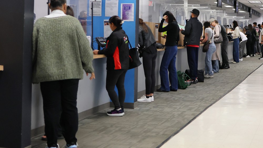 People line up at the New York State DMV in New York City.