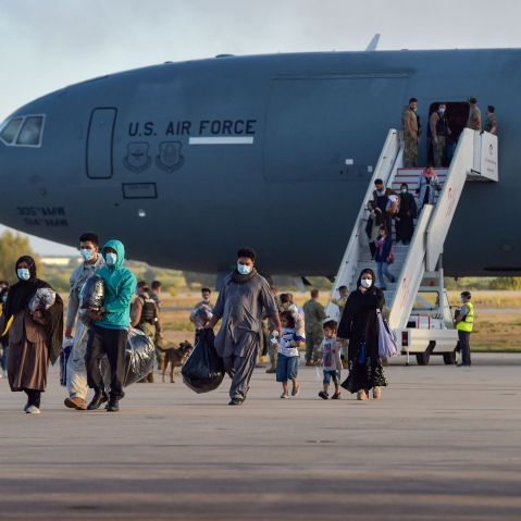 Afghan refugees disembark from a U.S. Air Force aircraft in Spain after an evacuation flight from Kabul on Aug. 31, 2021.