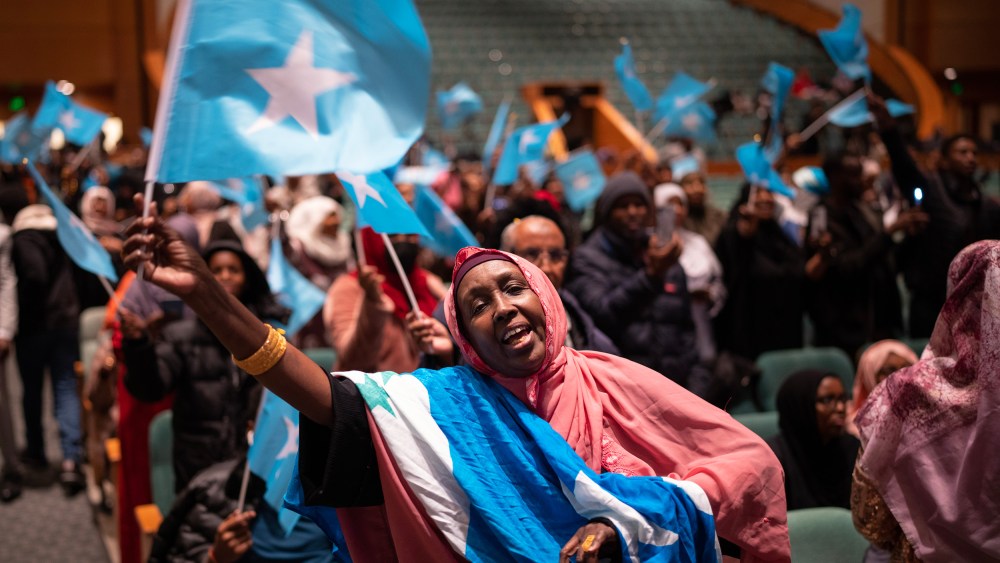 Members of the Somali community await the arrival of the president of Somalia at the Minneapolis Convention Center in Minneapolis.