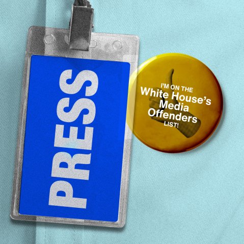 A press pass seen beside a button with a thumb's up that says "I'm on the White House Media Offender's List"
