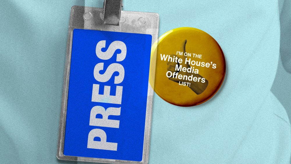 A press pass seen beside a button with a thumb's up that says "I'm on the White House Media Offender's List"