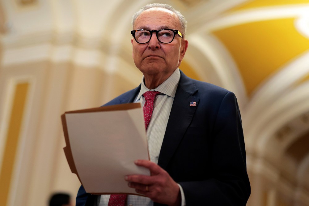 Senate Minority Leader Charles Schumer departs the Capitol.