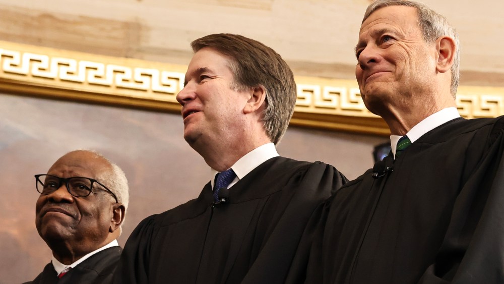 Associate Supreme Court Justices Clarence Thomas and Brett Kavanaugh and Supreme Court Chief Justice John Roberts during Donald Trump's inauguration in the Capitol.
