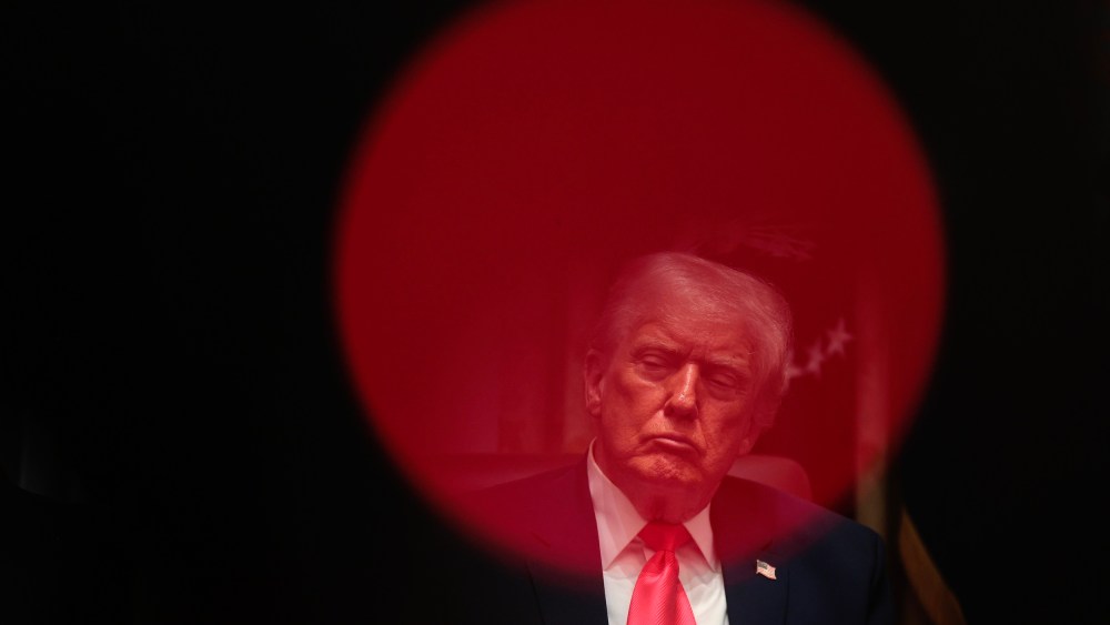 President Donald Trump sits in the Cabinet room.