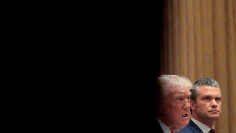 Donald Trump and Pete Hegseth sit in a Cabinet meeting