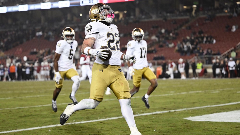 Aneyas Williams of the Notre Dame Fighting Irish runs the ball for a touchdown against the Stanford Cardinal.