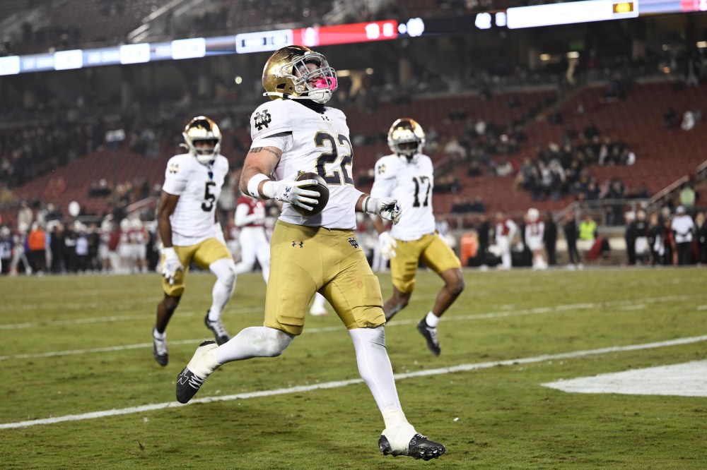 Aneyas Williams of the Notre Dame Fighting Irish runs the ball for a touchdown against the Stanford Cardinal.