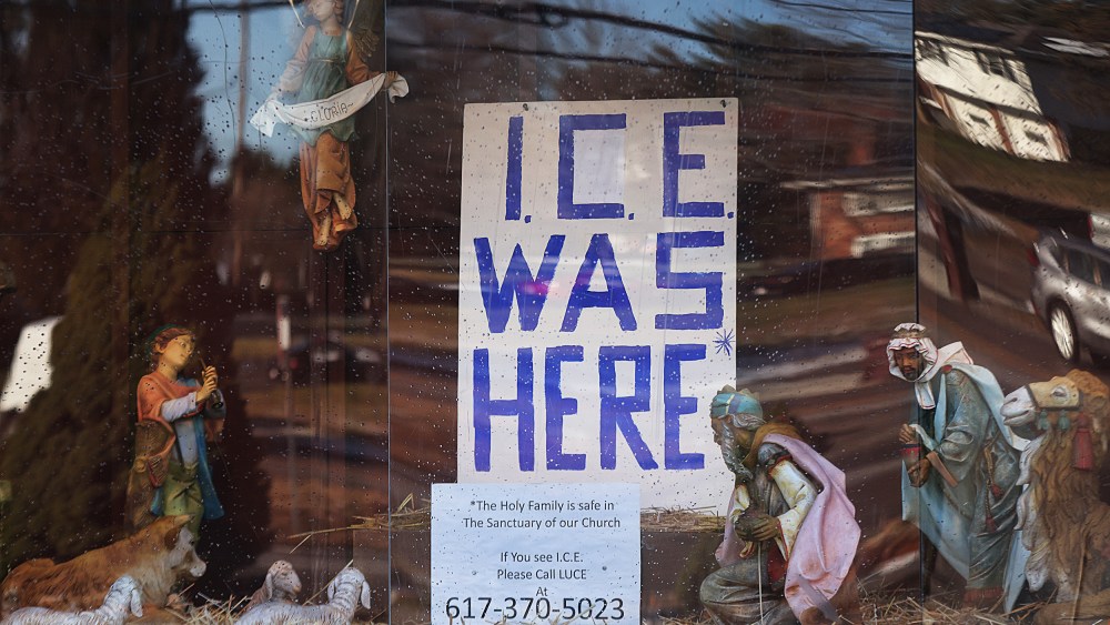 The Nativity scene at St. Susanna Parish displays a sign that reads "ICE WAS HERE" on Dec. 3, 2025.