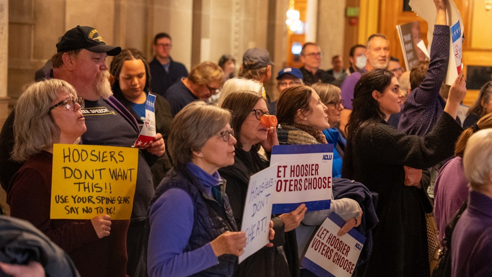 Demonstrators protest at the Indiana Statehouse in Indianapolis, I.N., on Dec. 11, 2025.