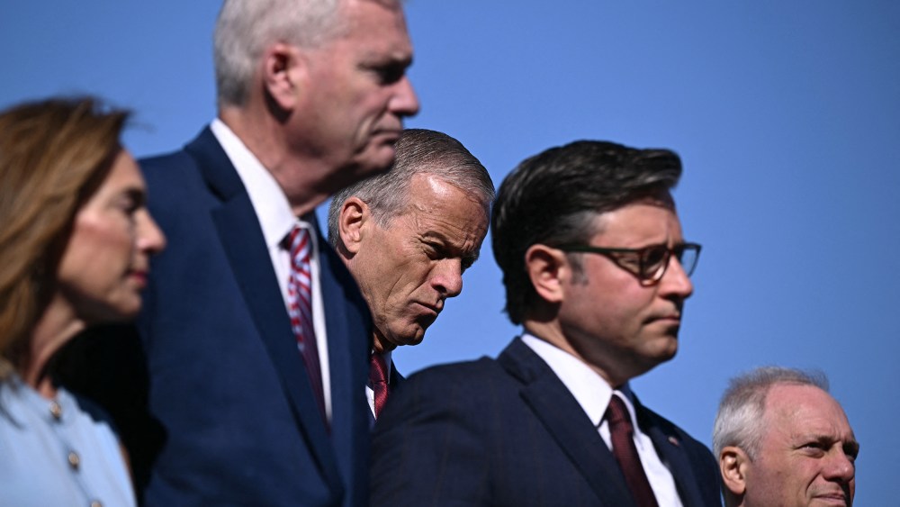 Senate Majority Leader John Thune, center, attends a news conference with Republican Congressional leadership outside the Capitol.