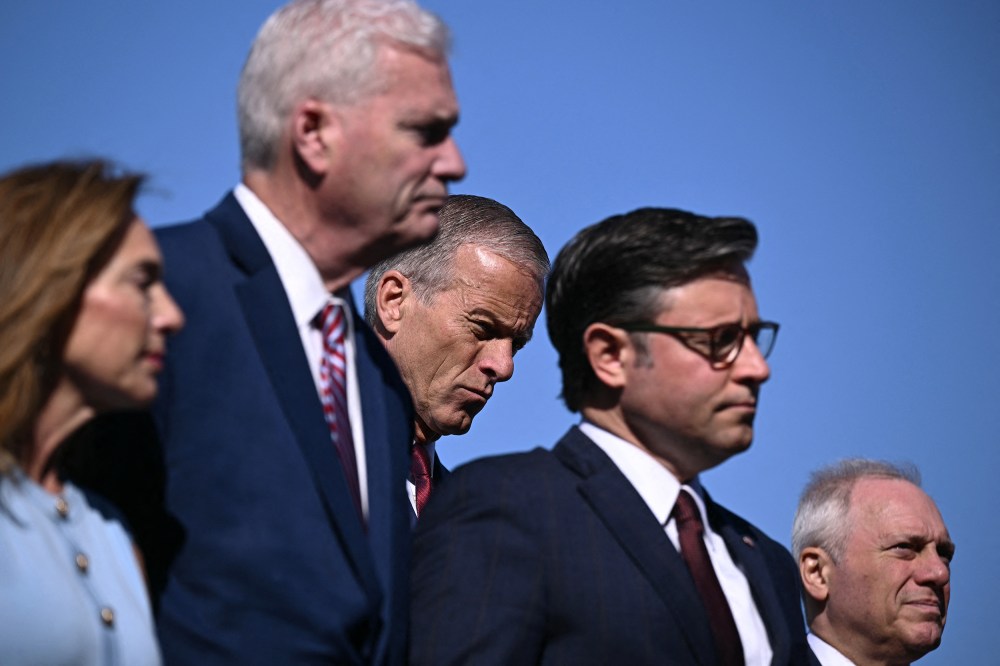 Senate Majority Leader John Thune, center, attends a news conference with Republican Congressional leadership outside the Capitol.