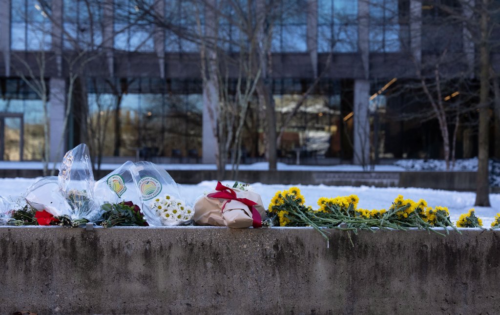 Flowers laid by mourners at Brown University in Providence, Rhode Island.