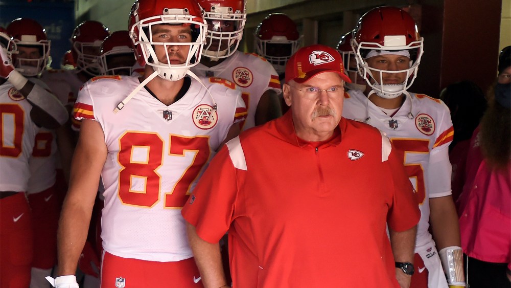 Head Coach Andy Reid, Travis Kelce #87 and Patrick Mahomes #15 of the Kansas City Chiefs look on before taking the field against the Washington Football Team.