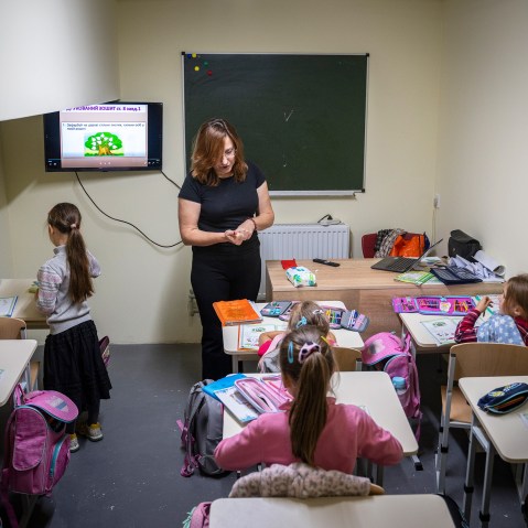 First-year students sit in class at an underground school equipped as a bomb shelter in Voznesenske, Chernihiv Region, Ukraine, on Sept. 15, 2025.
