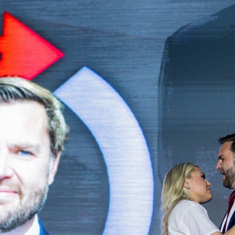 Erika Kirk and Vice President JD Vance embrace at the Pavilion at Ole Miss at the University of Mississippi.