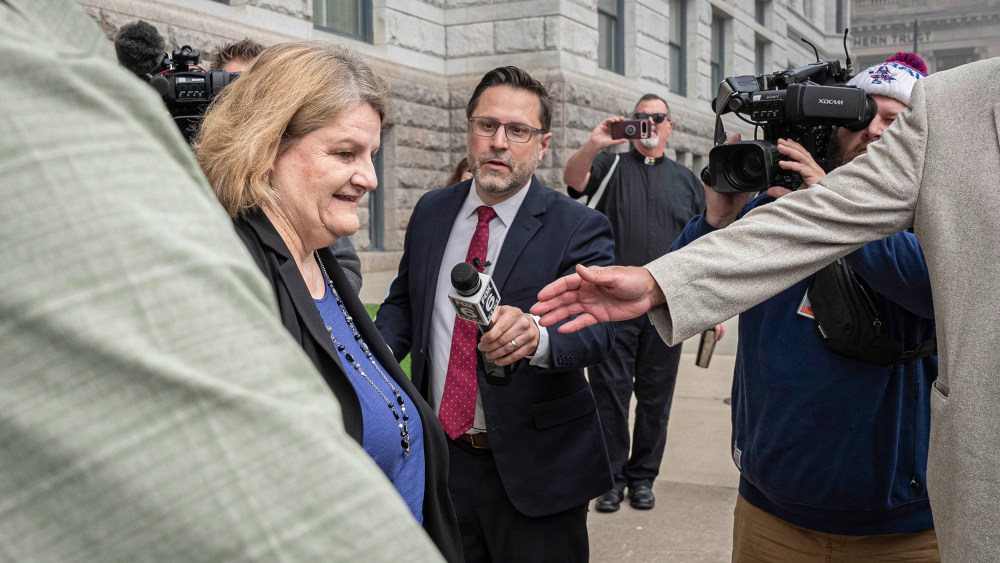 Milwaukee County Circuit Judge Hannah Dugan leaves the federal courthouse after a hearing.