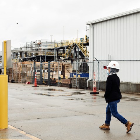 A Tyson Foods worker walks through a facility on April 24, 2020, in Lexington, Neb.