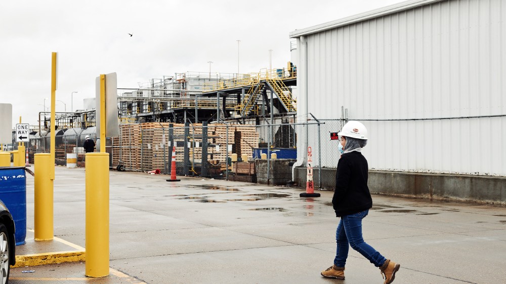 A Tyson Foods worker walks through a facility on April 24, 2020, in Lexington, Neb.