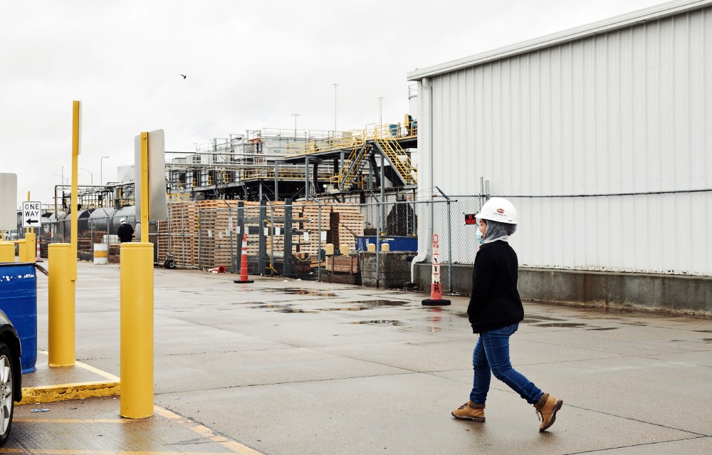 A Tyson Foods worker walks through a facility on April 24, 2020, in Lexington, Neb.