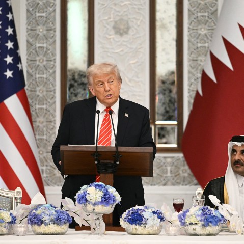 President Donald Trump and Qatar's Emir Sheikh Tamim bin Hamad al-Thani at a state dinner at the Lusail Palace in Doha, Qatar.