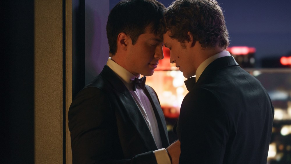 Hudson Williams, left, as Shane Hollander and Connor Storrie as Ilya Rozanov with their foreheads touching