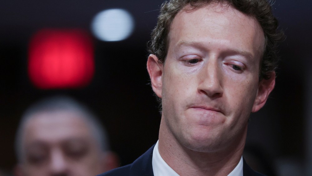 Meta CEO Mark Zuckerberg looks down as he testifies before the Senate Judiciary Committee.