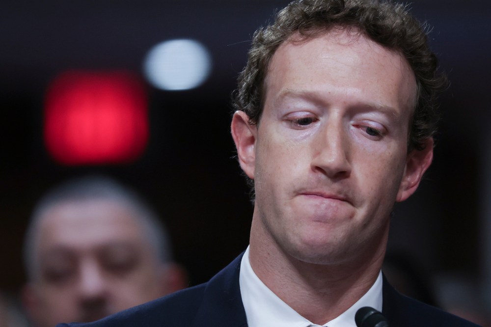 Meta CEO Mark Zuckerberg looks down as he testifies before the Senate Judiciary Committee.