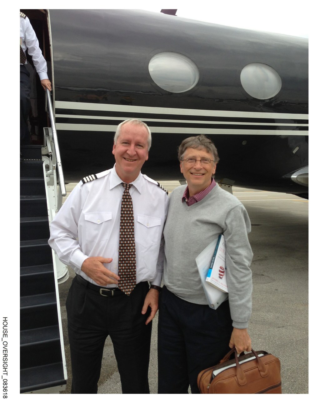 A photo of Bill Gates and Epsteins' long-time pilot Larry Visoski