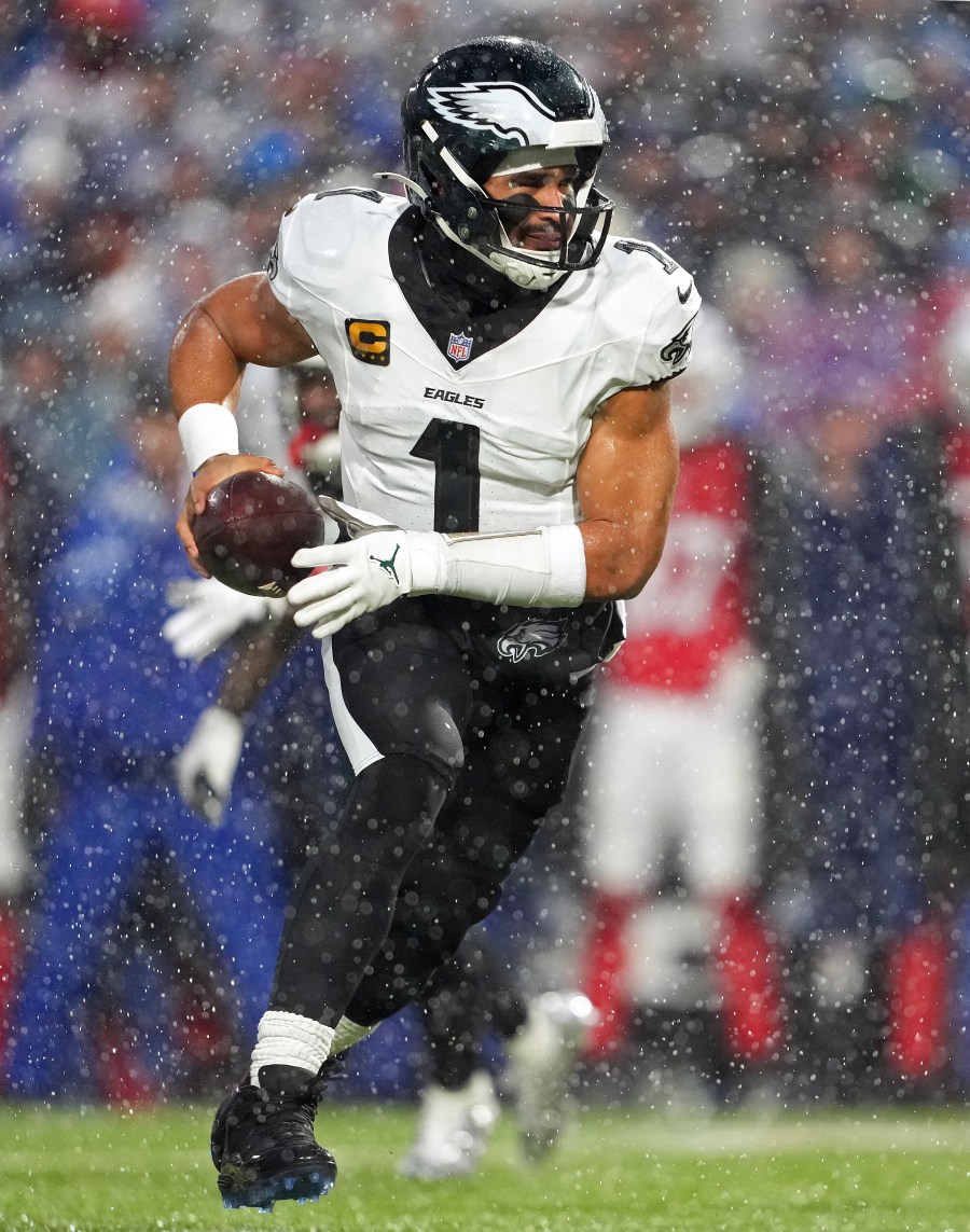 Jalen Hurts of the Philadelphia Eagles runs for yardage during the team’s game against the Buffalo Bills. The Eagles won, 13-12, after Bills quarterback Josh Allen missed an open receiver at game’s end.