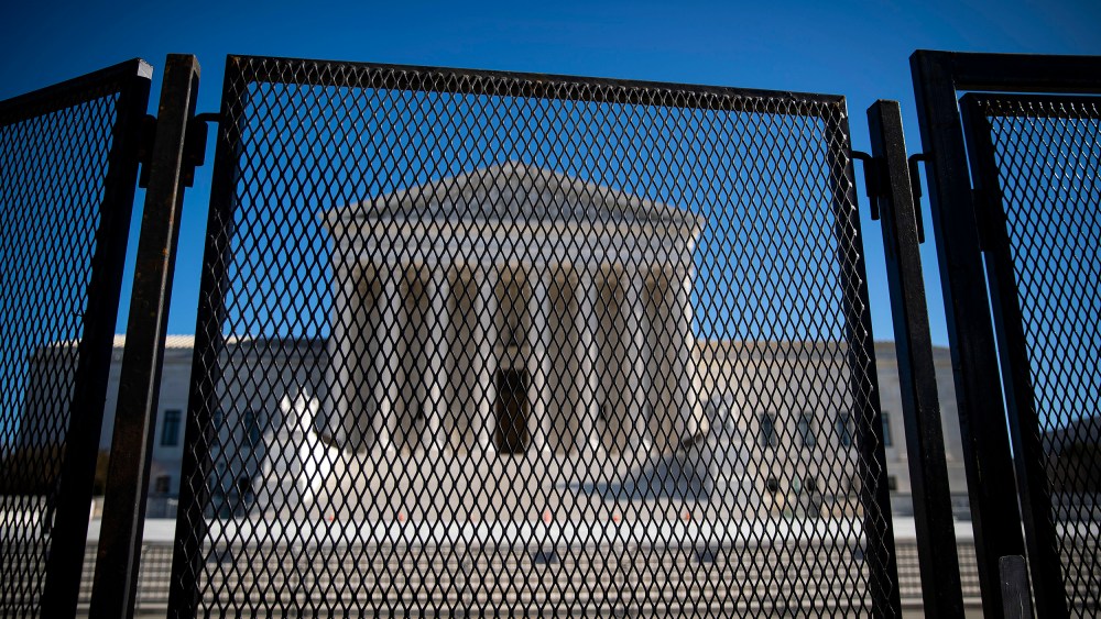 Protective fencing is erected around the U.S. Supreme Court on Jan. 10, 2021.