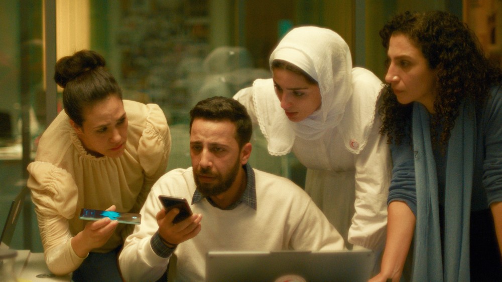 Still from "The Voice of Hind Rajab" with Motaz Malhees, Saja Kilani and Clara Khoury.