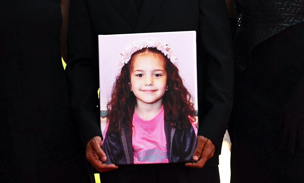 Guests hold a portrait of Hind Rajab during the red carpet for the movie "The Voice of Hind Rajab" presented at the 82nd International Venice Film Festival on Sept. 3, 2025.