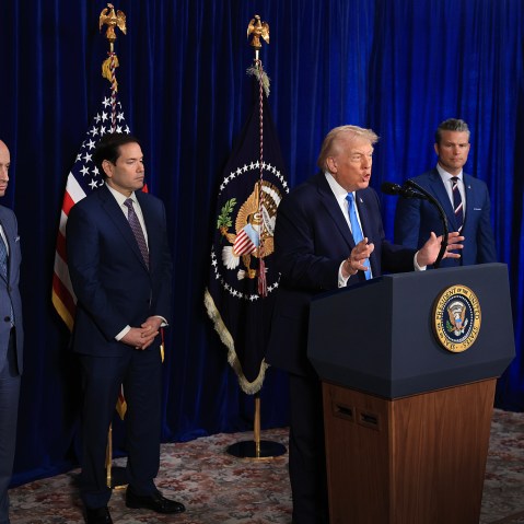 Homeland Security Advisor Stephen Miller, Secretary of State Marco Rubio, Secretary of War Pete Hegseth and Chairman of the Joint Chiefs of Staff Dan Caine listen as U.S. President Donald Trump addresses the media during a news conference at his Mar-a-Lago club on January 03, 2026, in Palm Beach, Florida.