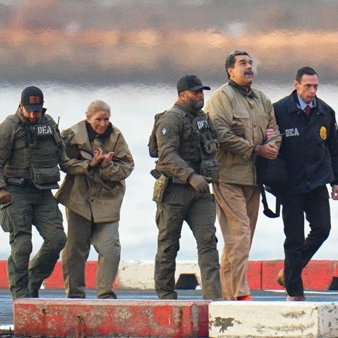Nicolás Maduro and his wife, Cilia Flores, in handcuffs escorted by heavily armed federal agents.