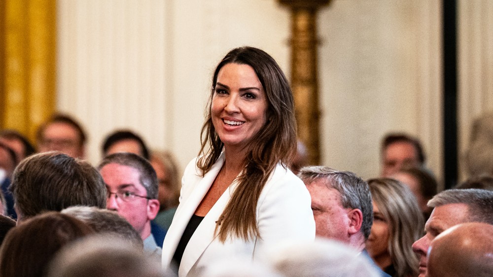 Sara Carter during a bill-signing ceremony on July 16, 2025, in the East Room of the White House.