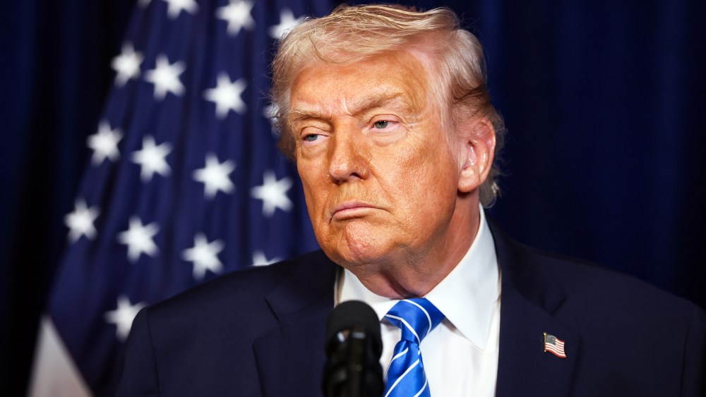 President Donald Trump listens during a press conference on Dec. 28, 2025 at his Mar-a-Lago club in Palm Beach, Fla.