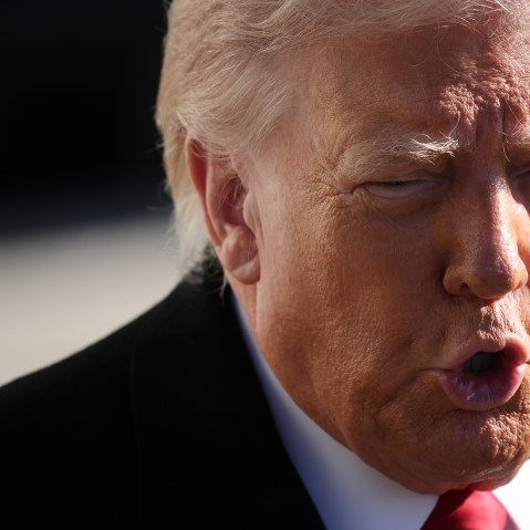 A very tight portrait of President Trump fills the frame as he is talking to the press outside of the White House.